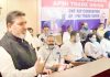 Apni Party president, Altaf Bukhari addressing party workers and traders in Jammu on Friday.