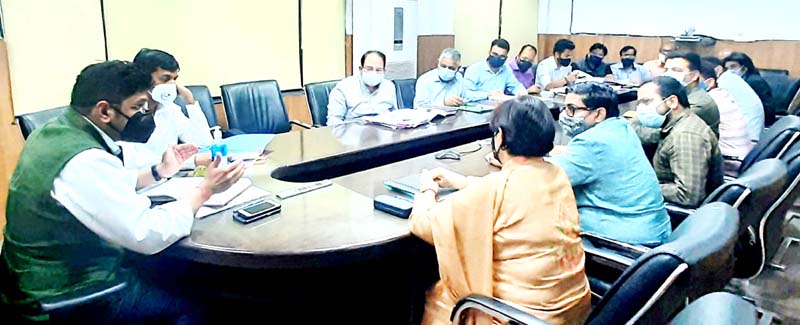 Divisional Commissioner Jammu Dr Raghav Langer chairing a meeting on Sunday. Divisional Commissioner Jammu Dr Raghav Langer chairing a meeting on Sunday.