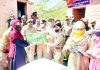 SP Ramban PD Nitya giving a sewing machine to a lady at Police Station Ramban. -Excelsior/Parvaiz Mir