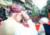 Union Home Minister Amit Shah greeting people during a road show in support of BJP candidates for West Bengal Assembly election at Kalimpong on Monday. (UNI)