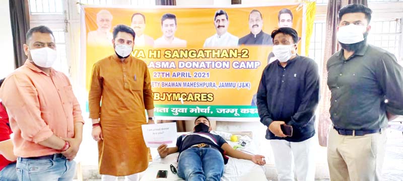 BJYM activist donating blood at a camp at Jammu on Tuesday. BJYM activist donating blood at a camp at Jammu on Tuesday.