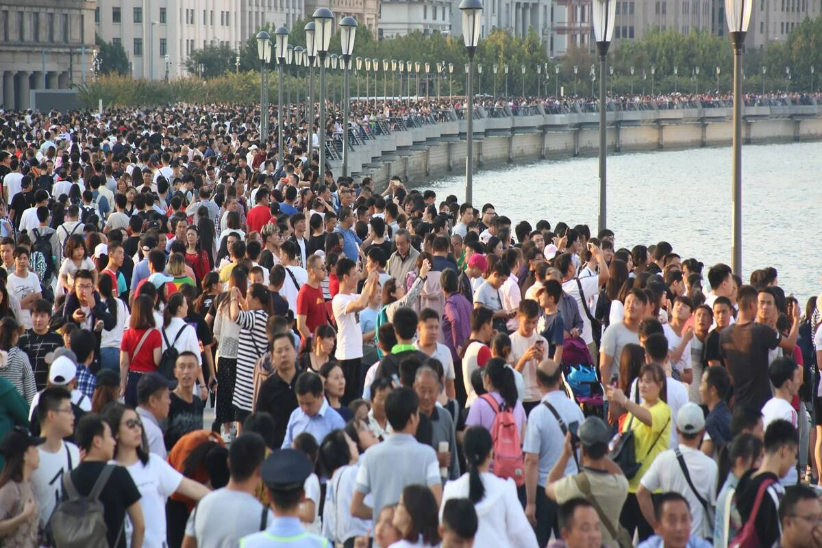 China's population grows marginally to 1.412 billion, may begin to