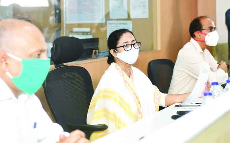 West Bengal Chief Minister Mamata Banerjee monitoring the Cyclonic storm Yaas from the Nabanna control room, in Kolkata on Wednesday. (UNI) West Bengal Chief Minister Mamata Banerjee monitoring the Cyclonic storm Yaas from the Nabanna control room, in Kolkata on Wednesday. (UNI)
