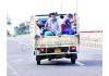People travel in a load carrier during lockdown at Bikram Chowk Jammu on Friday. —Excelsior/Rakesh