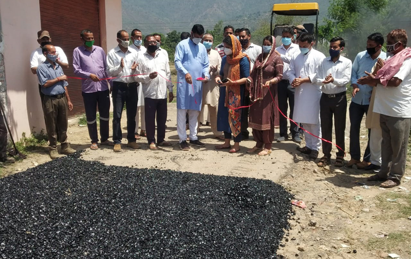 VC, DDC, Udhampur, Juhi Manhas kick starting black topping of road in Udhampur district on Monday. VC, DDC, Udhampur, Juhi Manhas kick starting black topping of road in Udhampur district on Monday.