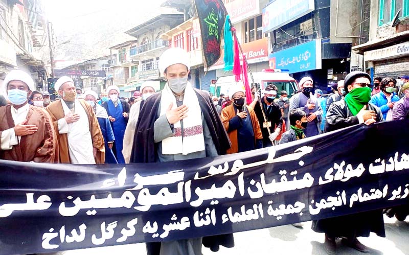 A religious procession being taken out in Kargil town on Tuesday. -Excelsior/Basharat Ladakhi A religious procession being taken out in Kargil town on Tuesday. -Excelsior/Basharat Ladakhi