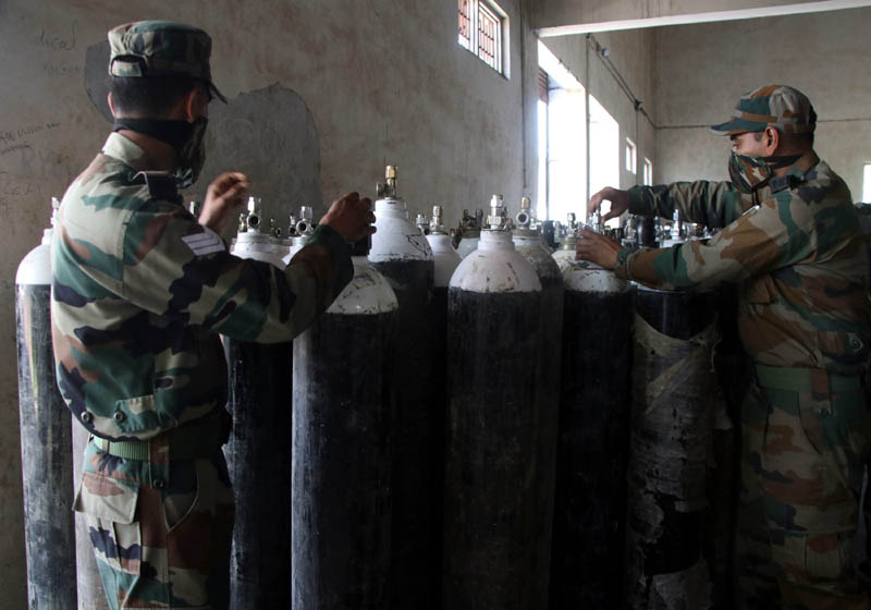 Army personnel at oxygen generation plant at Rangreth in city outskirts of Srinagar on Thursday. Army personnel at oxygen generation plant at Rangreth in city outskirts of Srinagar on Thursday.
