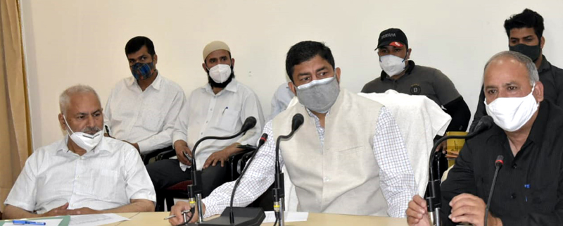 DDC Rajouri Chairman Ch Naseem Liaqat and members addressing a press conference in Rajouri on Friday. DDC Rajouri Chairman Ch Naseem Liaqat and members addressing a press conference in Rajouri on Friday.
