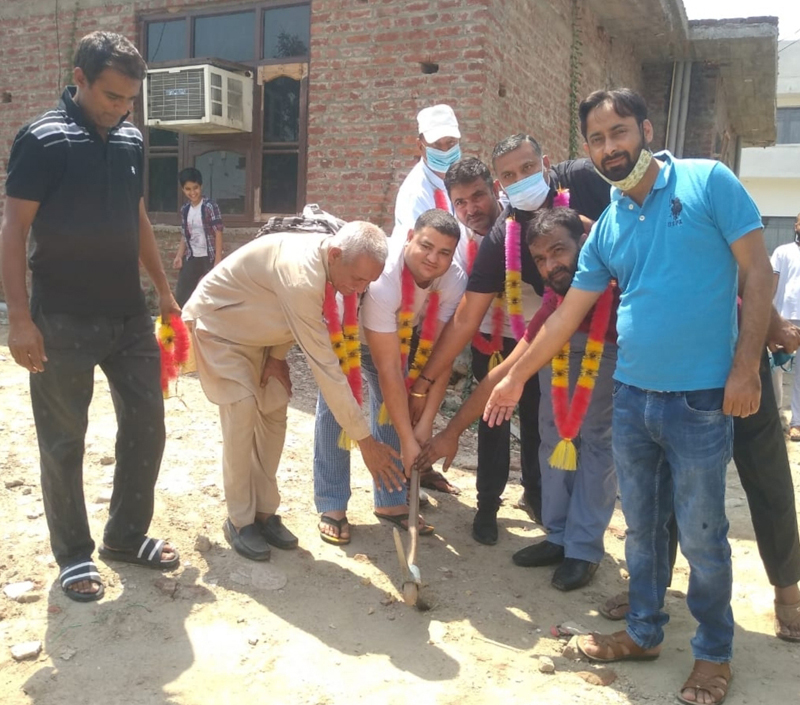 Councillor Pritam Singh inaugurating lane-drain work at Ward No. 55 on Wednesday. Councillor Pritam Singh inaugurating lane-drain work at Ward No. 55 on Wednesday.