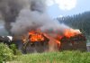 Houses on fire in village Hijwa of tehsil Khari in district Ramban on Tuesday. -Excelsior/Pervaiz