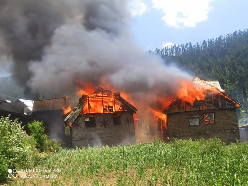 Houses on fire in village Hijwa of tehsil Khari in district Ramban on Tuesday. -Excelsior/Pervaiz