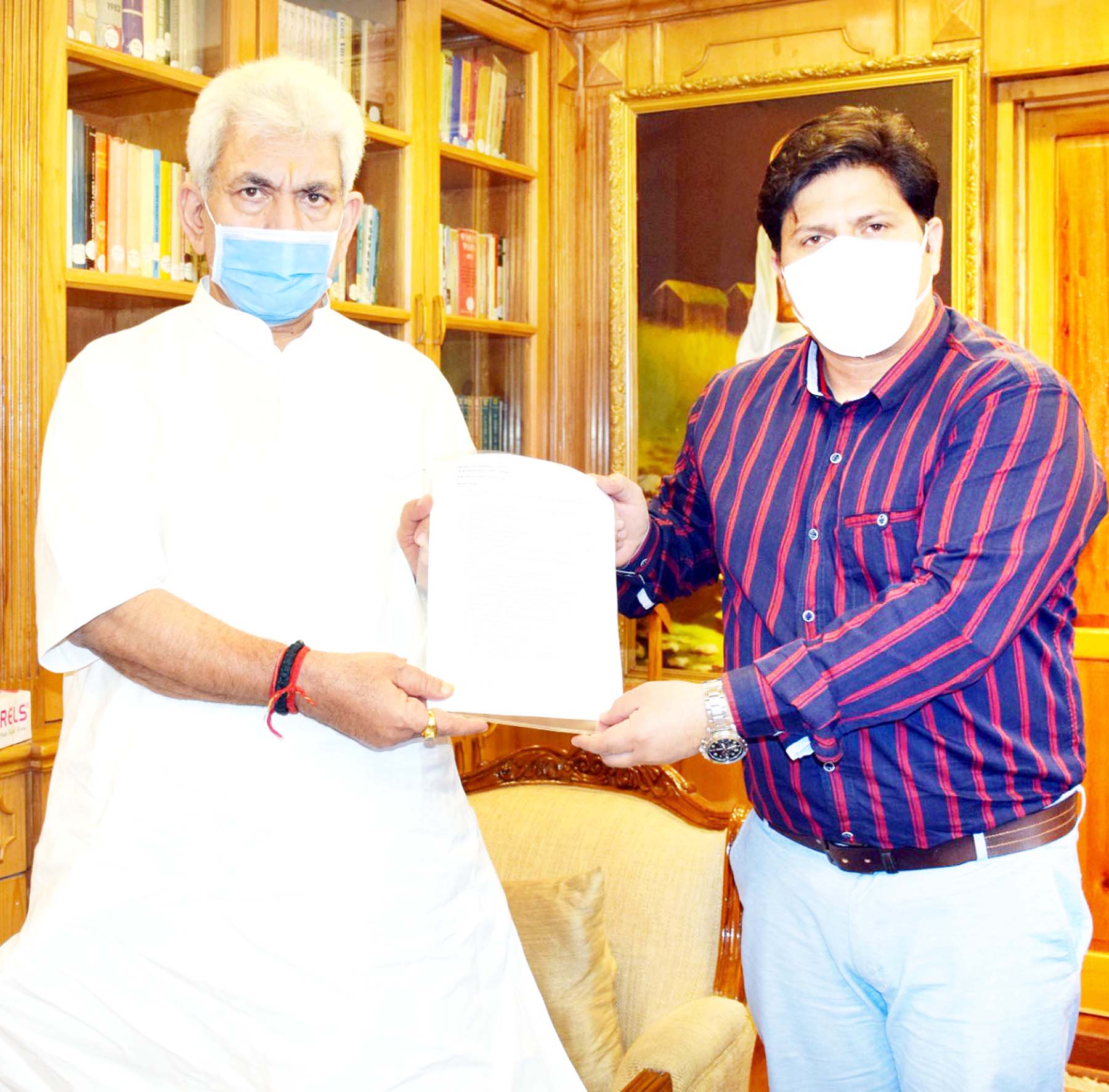 Lt Governor Manoj Sinha with Irfan Manhas, Vice-Chairperson of DDC Shopian. Lt Governor Manoj Sinha with Irfan Manhas, Vice-Chairperson of DDC Shopian.