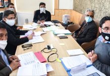 Commissioner Secretary Ajeet Kumar Sahu chairing a meeting.