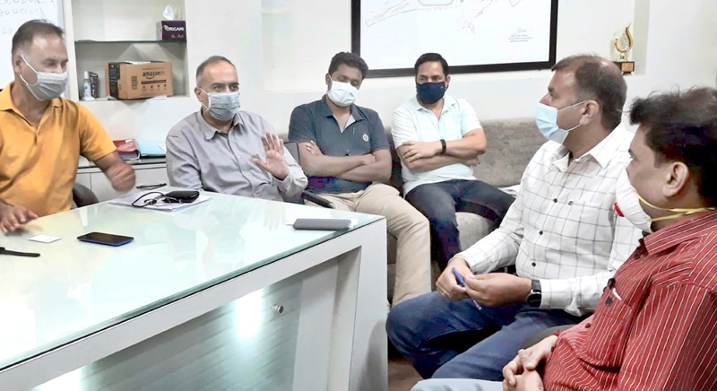 BJP leaders, Arvind Gupta and Balbir Ram Rattan in a meeting with Director General of J&K Family Welfare. BJP leaders, Arvind Gupta and Balbir Ram Rattan in a meeting with Director General of J&K Family Welfare.