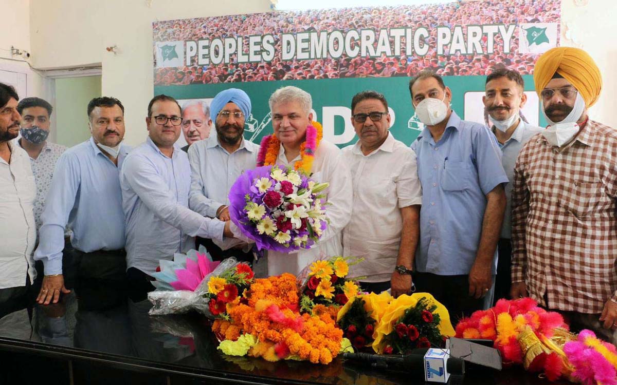 PDP leaders presenting bouquet to new PAC member Anil Sethi at party office in Jammu. PDP leaders presenting bouquet to new PAC member Anil Sethi at party office in Jammu.