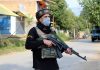 A security personnel stands alert at the site of encounter in Anantnag on Saturday. — Excelsior/Sajad Dar