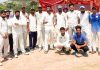 Winning team posing for group photograph after the match in Jammu on Sunday.