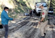 DM Kishtwar Ashok Sharma during inspection of Chatroo-Sinthan Road. - Excelsior/Tilak Raj