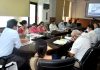 Divisional Commissioner Jammu chairing a meeting on Sunday.