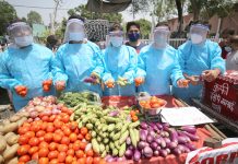 Unemployed dental surgeons selling vegetables as a mark of protest in Jammu. —Excelsior/Rakesh