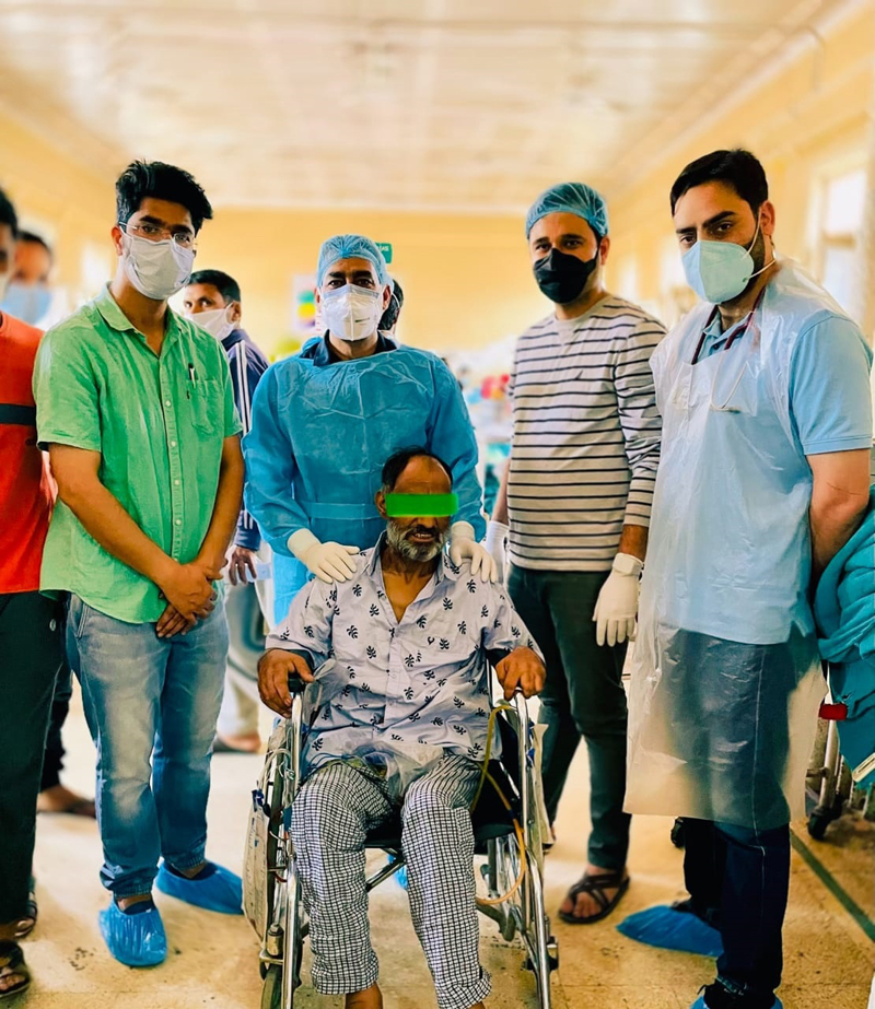 A team of doctors posing with a patient in GMC Srinagar. A team of doctors posing with a patient in GMC Srinagar.