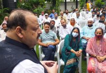 NC provincial president Devender Singh Rana interacting with a delegation.