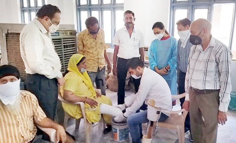 Doctors and patients during artificial limb fitment camp at Jammu. Doctors and patients during artificial limb fitment camp at Jammu.