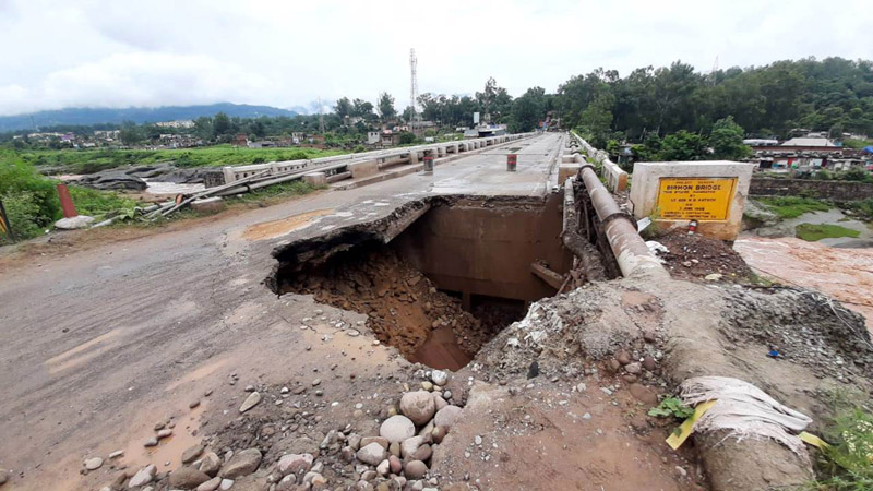 Damaged portion of approach road to Birma Bridge near Udhampur. —Excelsior/K Kumar Damaged portion of approach road to Birma Bridge near Udhampur. —Excelsior/K Kumar