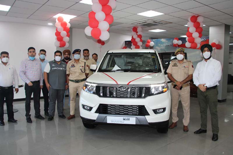 Dignitaries unveiling new Bolero Neo at Shuhul Automobiles. -Excelsior/Rakesh Dignitaries unveiling new Bolero Neo at Shuhul Automobiles. -Excelsior/Rakesh