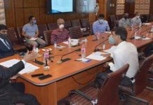 Advisor R R Bhatnagar chairing a meeting on Wednesday.