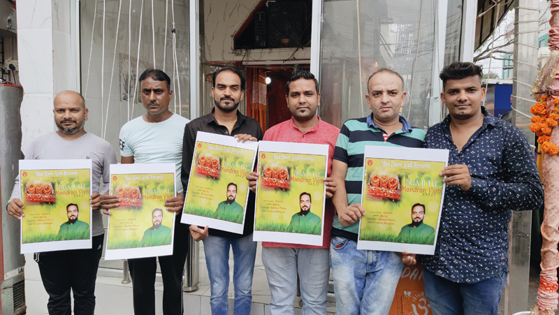 BJP Sanskriti Cell convenor Sahil Mahajan along with other releasing devotional album at Jammu on Tuesday. BJP Sanskriti Cell convenor Sahil Mahajan along with other releasing devotional album at Jammu on Tuesday.