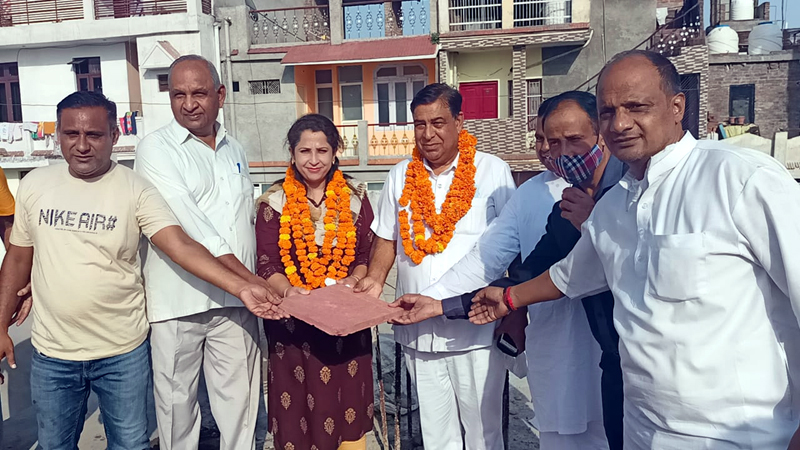 Former MLC Ravinder Sharma and Councillor Ritu Choudhary inaugurating tile works in Ward 7. Former MLC Ravinder Sharma and Councillor Ritu Choudhary inaugurating tile works in Ward 7.