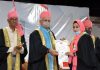 Lieutenant Governor Manoj Sinha presenting certificate to a student during special convocation of Kashmir University on Wednesday.