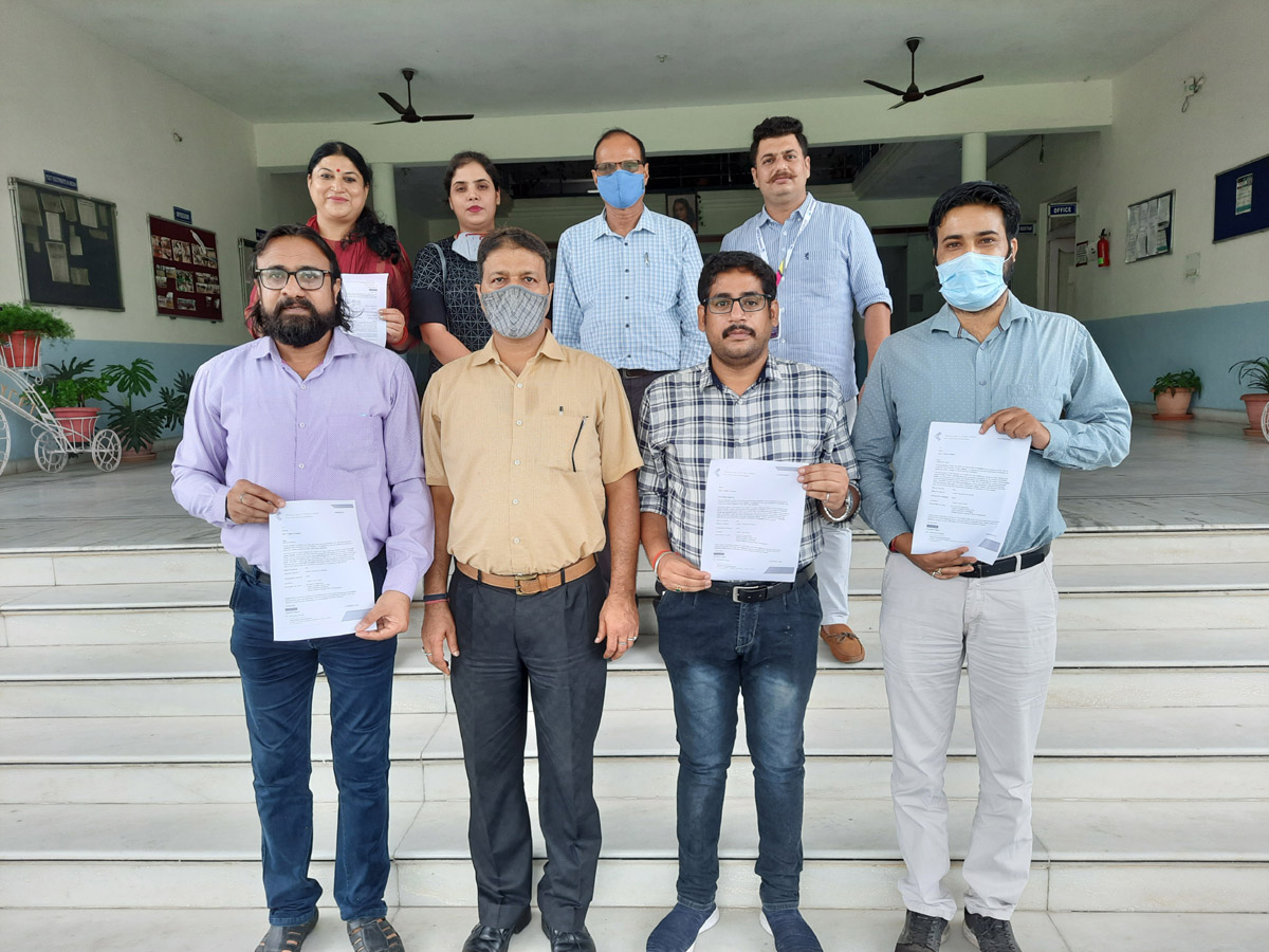 Students of YCET and IMS posing for a group photograph after being selected for jobs during a placement drive. Students of YCET and IMS posing for a group photograph after being selected for jobs during a placement drive.