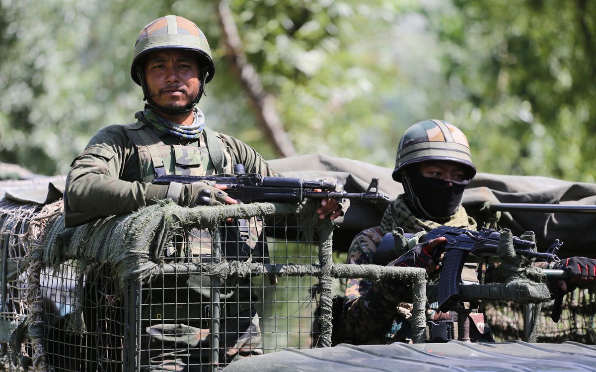 Security forces during encounter at Chandaji area of Bandipora district on Tuesday. — Excelsior/Aabid Nabi
