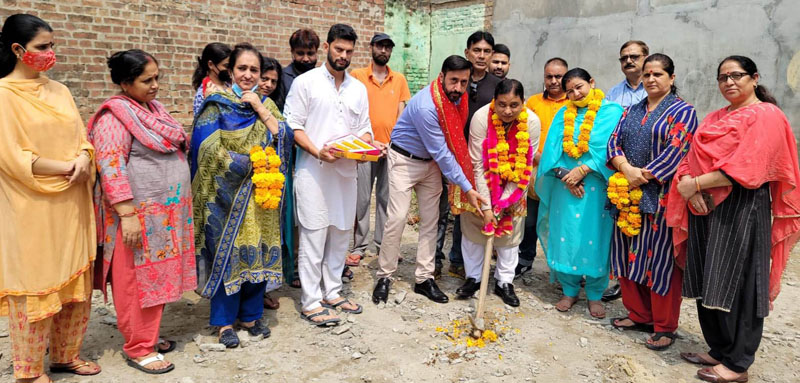 Former Minister Sat Sharma along with Councillor Suneet Raina starting lane-drain work at Ward 9 on Friday. Former Minister Sat Sharma along with Councillor Suneet Raina starting lane-drain work at Ward 9 on Friday.