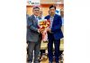 CMD J&K Bank presenting bouquet to outgoing Executive President.
