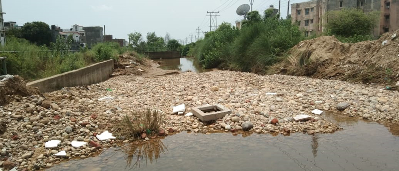 Stones accumulated in nallah. Stones accumulated in nallah.