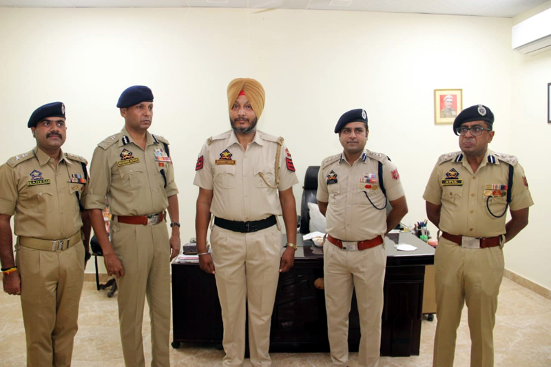 ADGP Jammu Zone and other officers during new rank pinning ceremony. ADGP Jammu Zone and other officers during new rank pinning ceremony.