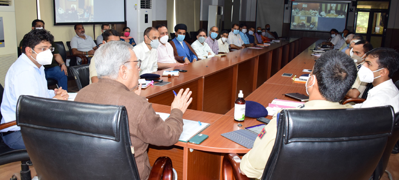 Advisor Farooq Khan chairing a meeting on Thursday. Advisor Farooq Khan chairing a meeting on Thursday.