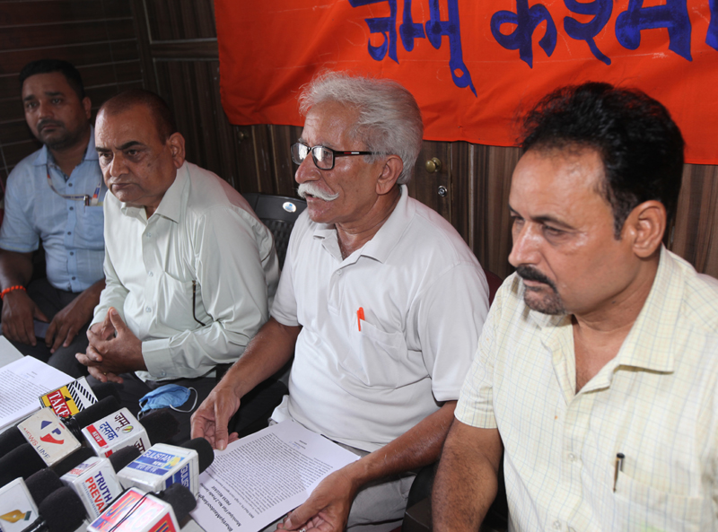 Bhartiya Mazdoor Sangh leaders addressing a press conference at Jammu on Friday. -Excelsior/Rakesh Bhartiya Mazdoor Sangh leaders addressing a press conference at Jammu on Friday. -Excelsior/Rakesh
