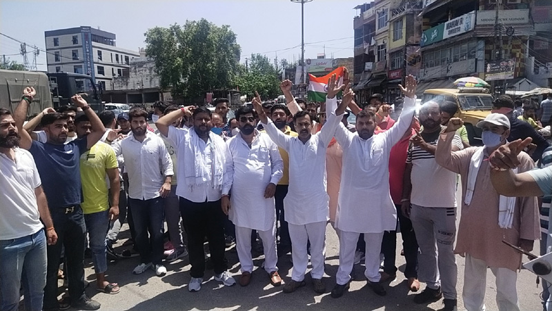People staging protest against BJP at Akhnoor on Monday. People staging protest against BJP at Akhnoor on Monday.