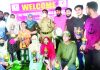 Winners posing for a group photograph with chief guest, DySP Riaz Ahmad at Shopian on Tuesday.