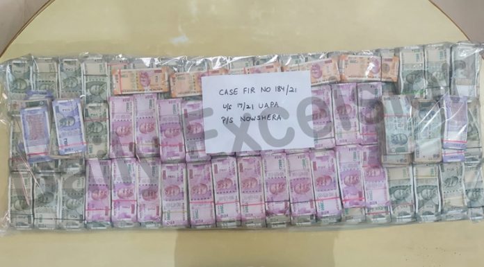 Huge cash recovered by police from drug smuggler's house in Nowshera area of Rajouri on Tuesday. —Excelsior/Gafoor Bhat