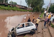 Ill-fated vehicle after accident in Marallian area of Miran Sahib in Jammu.