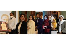 Lieutenant Governor Manoj Sinha awarding the youth in Srinagar on Sunday. —Excelsior/Shakeel