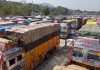 Trucks stranded at Toll Plaza Qazigund. —Excelsior/Sajad Dar