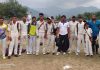 Winning team posing for a group photograph after the match at Poonch on Wednesday.
