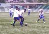 Players in action during a Football match at TRC Synthetic Turf ground in Srinagar on Wednesday.