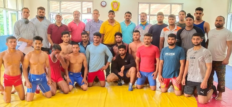Selected wrestling players posing for a group photograph with dignitaries at Jammu.